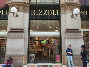 Rizzoli Bookstore in Milan at  northern end of Galleria Vittoria Emanuelle II near Piazza Scala .