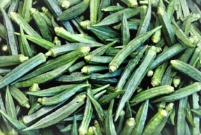 Okra is a vegetable consisting of long tapered green parts the pods contain edible seeds.