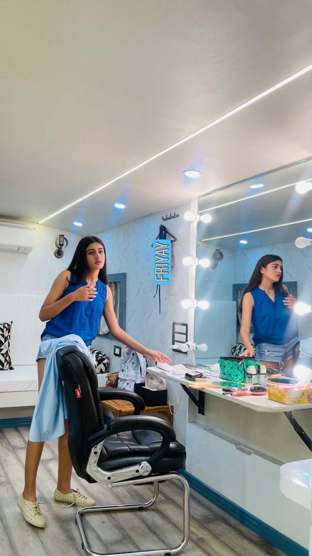 Aadhya Anand in Makeup room getting ready for shoot in blue dress