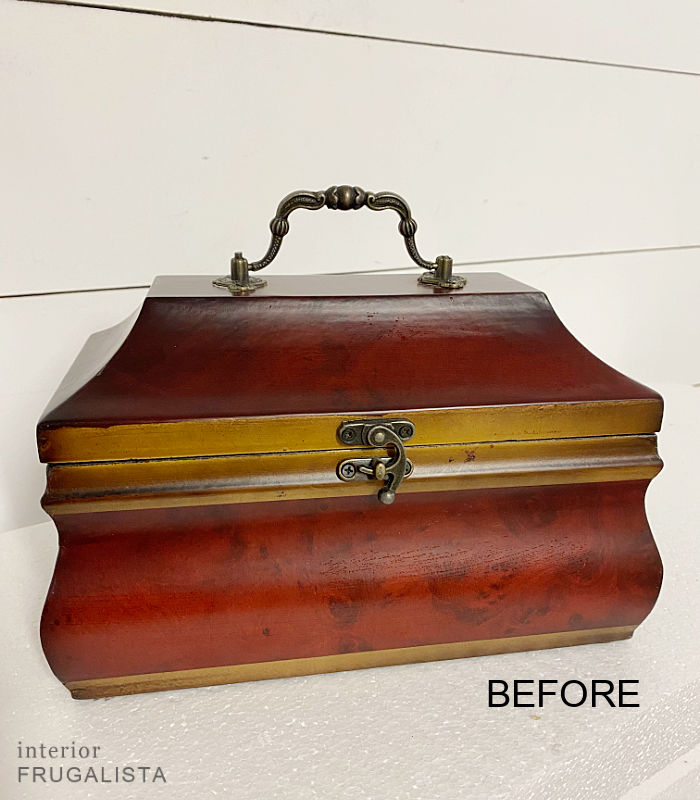 A small wooden Bombay-style jewelry box before being upcycled into a small tea storage box.