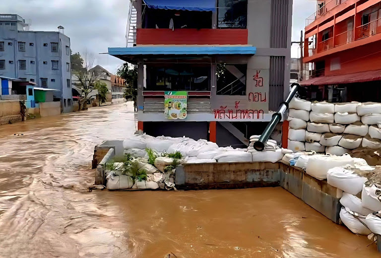 Swollen rivers inundate Thailand, prompting sandbag defenses and a climate reckoning.