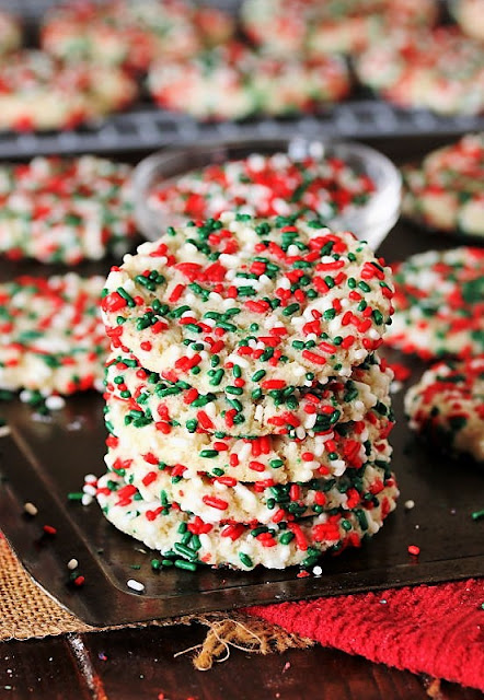 Stack of Christmas Sprinkle-Coated Sugar Cookies Image