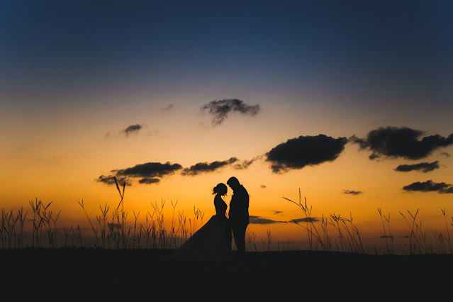 sunset photo with bride and groom