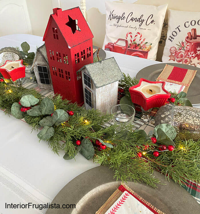 How to turn dollar store bird houses into adorable wood Scandi houses with DIY galvanized roofs for an easy five minute Christmas table centerpiece.