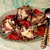 Flores de alcachofas con lascas de queso y jamón ibérico