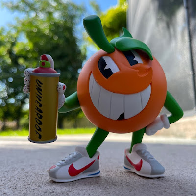 UNHEARDOF Edition Atomik Orange Vinyl Figure by Atomik x UVD Toys