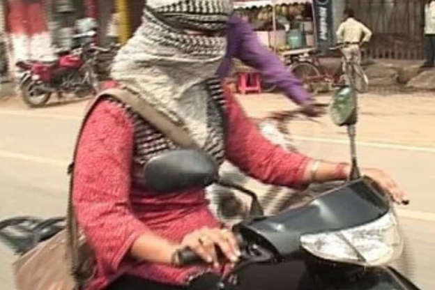 A Delhi girl can't take out her scooty ever once as she got a strange number plate by Delhi Regional Transport Office (RTO).