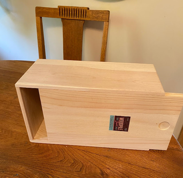 Photo of an unfinished wooden tissue box holder from Hobby Lobby.