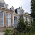 A manse, a mansion, and a villa on a loch