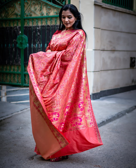 Banarasi silk saree with Patola style body and paithani style border and pallu.