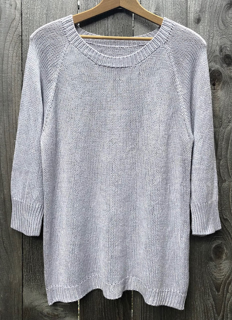 Silver-colored pullover knitted with Truboo yarn top down with raglan sleeves