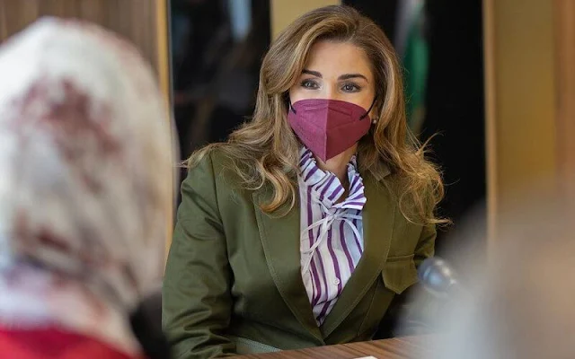 Queen Rania wore a new khaki green structured military jacket by Loewe, and a new ruffle neck purple striped shirt by Plan C