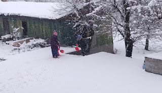 Angela, Rosie and Grandma having fun in the snow