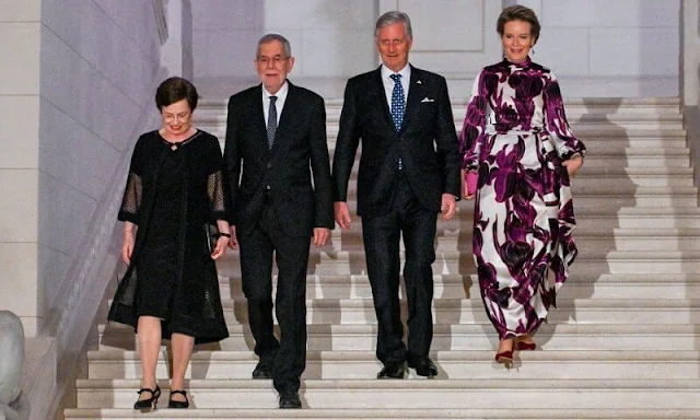 Queen Mathilde wore floral print long sleeve silk dress by Dries van Noten. President Alexander Van der Bellen and Doris Schmidauer