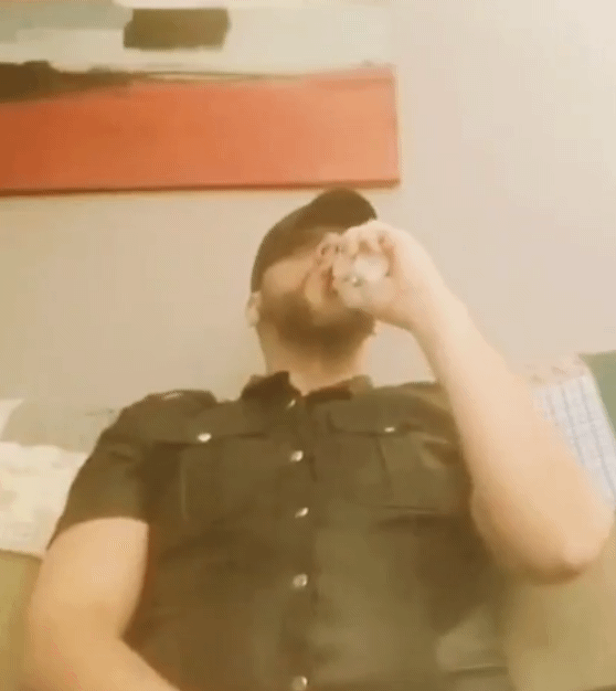 Leatherman Smoking vape In Leather Hat, Pants And Shirt Sitting Superior