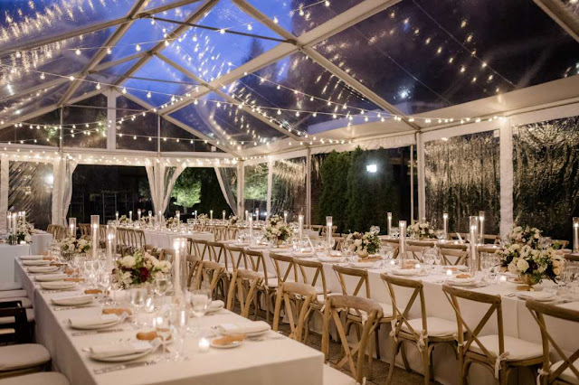 String Lights hanging under a clear top tent at The Foundry