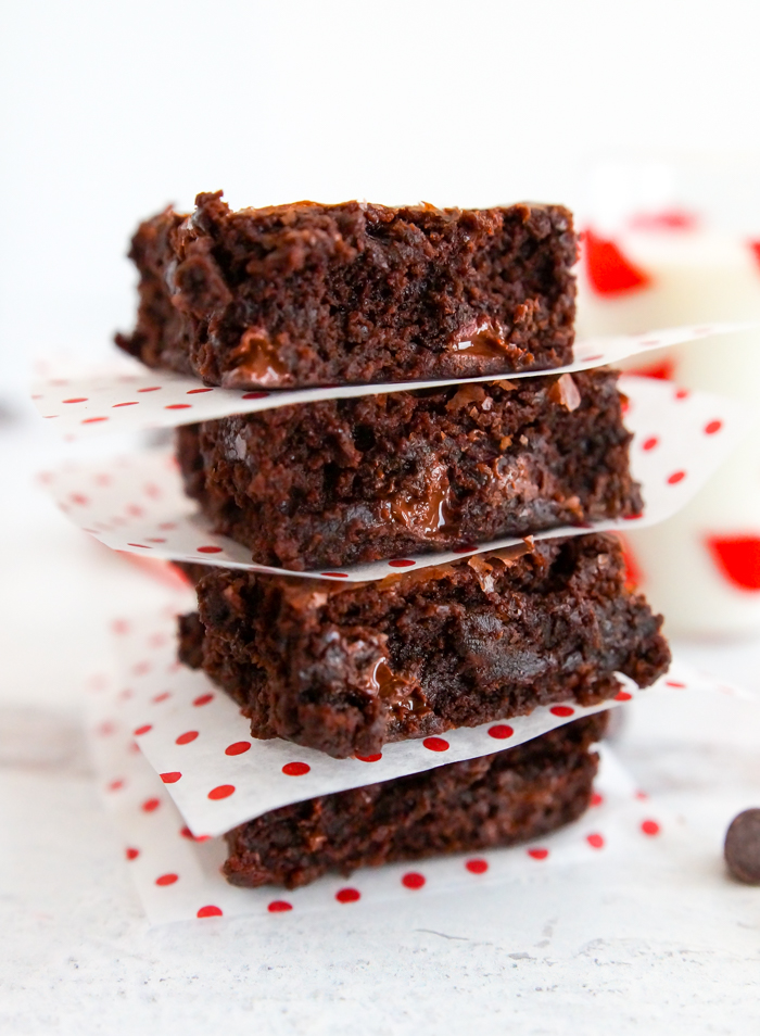 stack of brownies with polka dot parchment paper