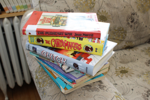 stack of contemporary middle-grade fiction books