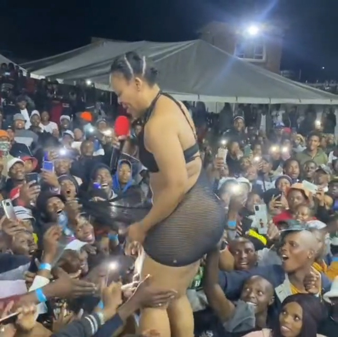 Pantless dancer, Zodwa Wabantu allows fans dip their hands between her thighs as she performs in skimpy see-through piece (video)