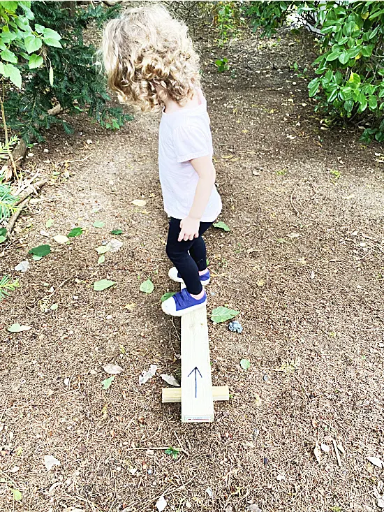 walking across balance beam