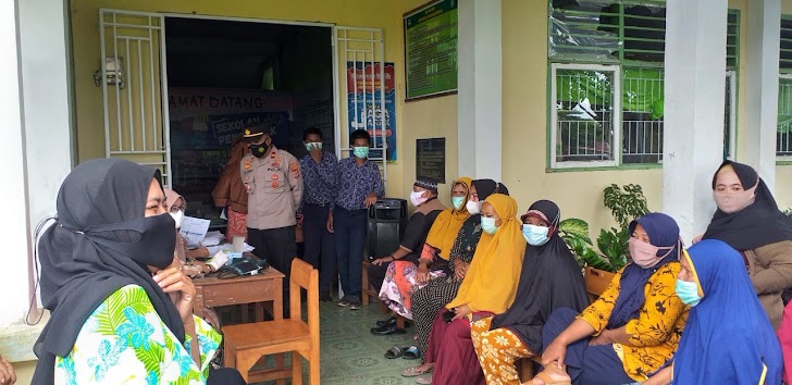 INILAH Kapolsek Marbo, Memantau Langsung Giat Vaksinasi di Wilayahnya