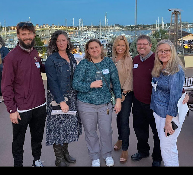 St. Augustine High School teachers at the Power of an Hour PTO Fundraiser at the Whiteroom Rooftop