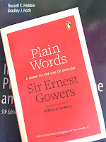 Plain Words, by Sir Ernest Gowers, superimposed on Intermediate Physics for Medicine and Biology.