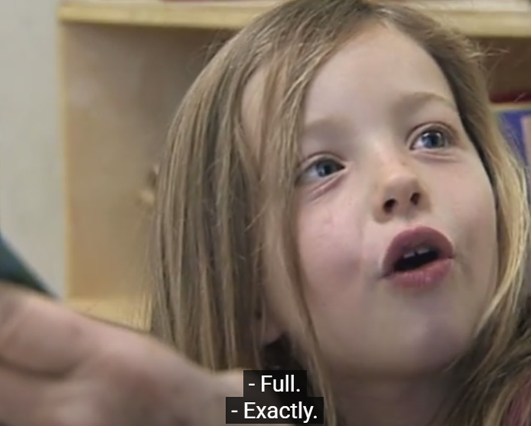 A child with her mouth open

AI-generated content may be incorrect.