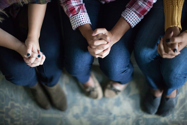 Hands folded in prayer