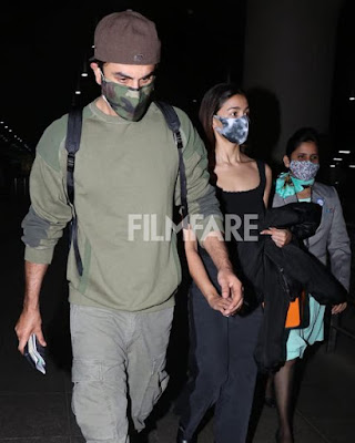 Ranbir & Alia Bhatt were spotted at the airport as they returned from their New Year vacation