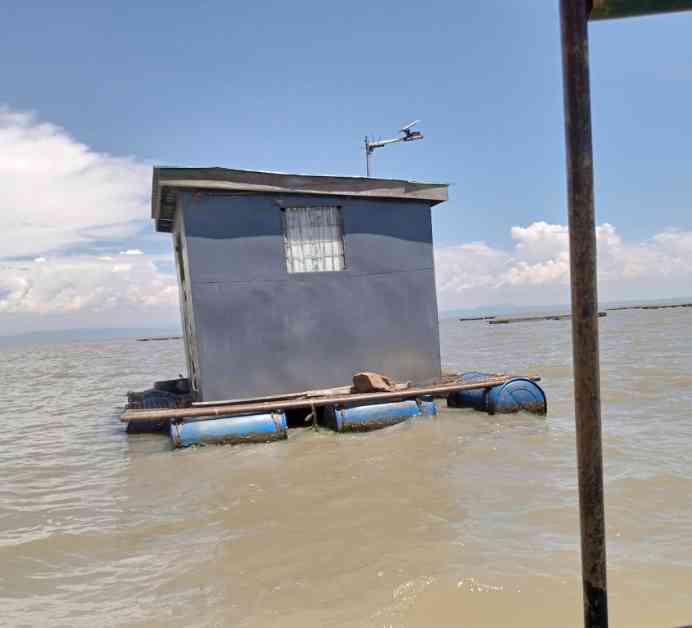 Image of a House floating on the water of a fish net protector in Dunga Beach Lake Victoria