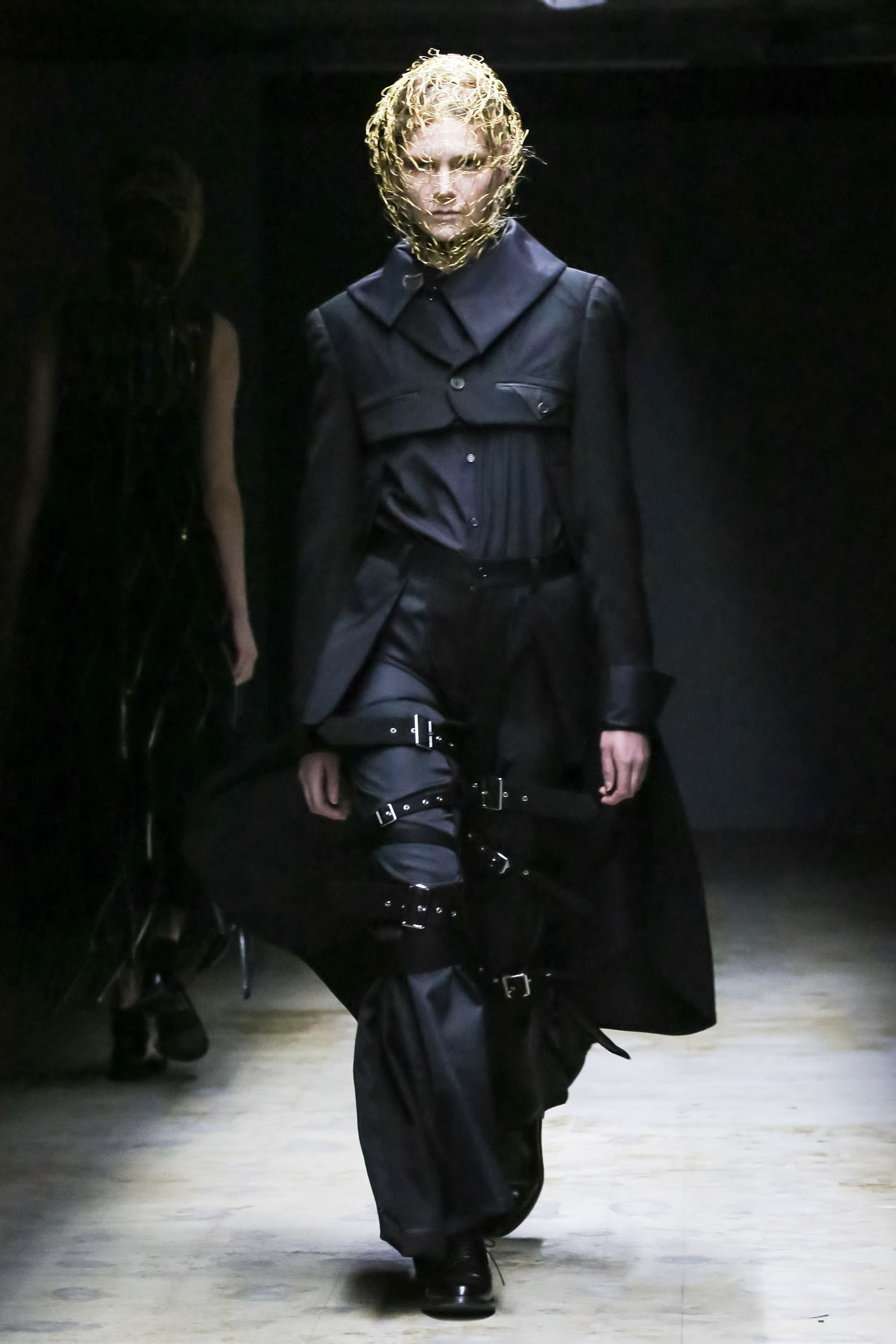 Image may contain Noir Kei Ninomiya Clothing Apparel Human Person Fashion Runway Long Sleeve and Sleeve