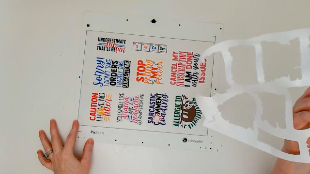 Peel off the excess paper around the stickers