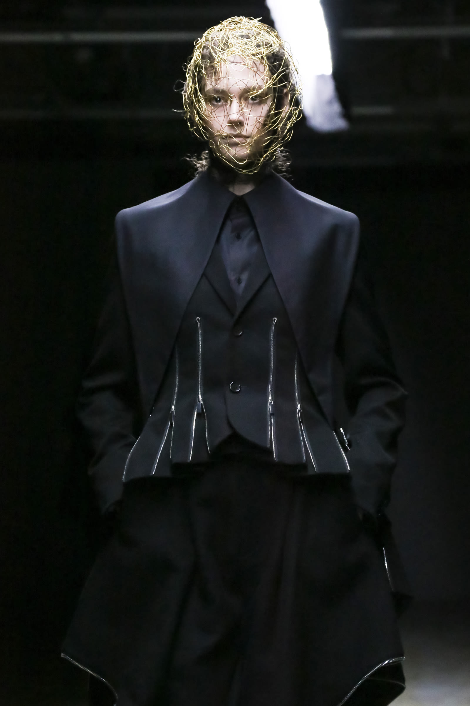 Image may contain Noir Kei Ninomiya Clothing Apparel Human Person Fashion Runway Long Sleeve and Sleeve