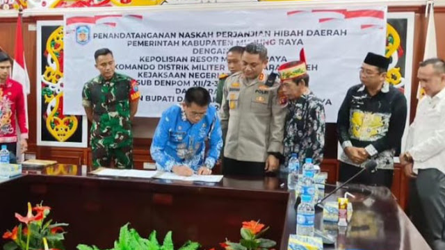 Pj Bupati Murung Raya Lakukan Penandatanganan NPHD Untuk Pilkada 2024