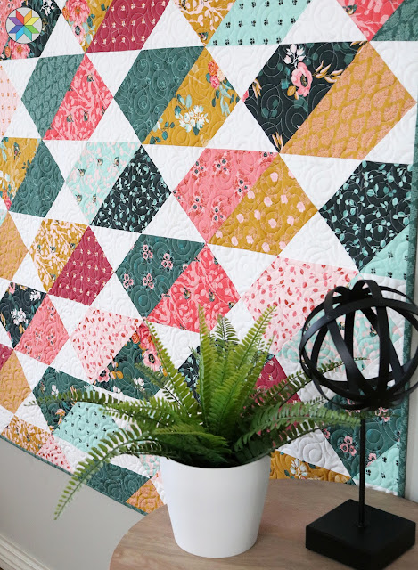 Plot Twist quilt pattern by Andy Knowlton of A Bright Corner a modern layer cake and fat quarter quilt pattern with five sizes