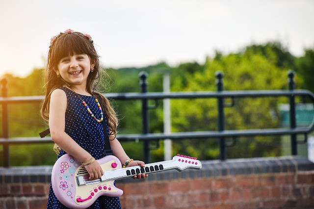 Kid playing an instrument