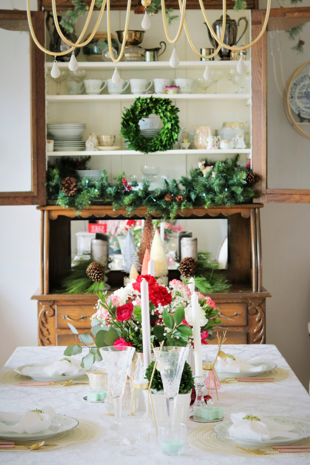 carnations-pine-trees-white-tablecloth-simple-elegance-homemaking