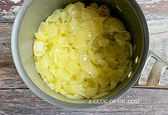 Onions in a saucepan - making onion sauce