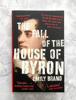 A book titled "Fall of the House of Byron" on a mottled grey background.