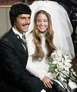 Suzy Weiner with her husband Mark Spitz in their wedding dress