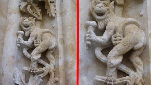 A Gargoyle has been carved into a Spanish Cathedral stone wall.