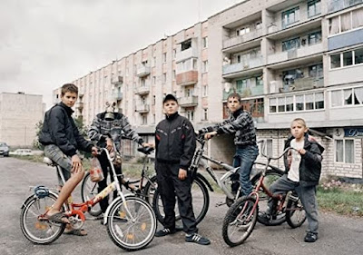 A young bicycle gang in front of the British Projects