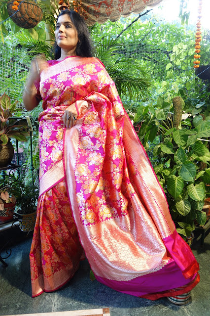 Fuschia pink Banarasi ektara silk saree with bouquet of flower motifs woven all across