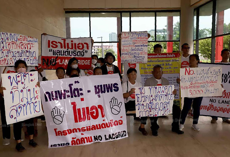 Protesters brandish signs as Thailand’s Land Bridge project faces skepticism, disrupts lives.