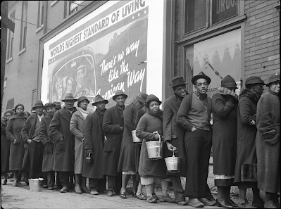 Line of African Americans at a Red Cross relief station in front of billboard that says "There's No Way Like The American Way", following flood in Louisville, Kentucky in 1937