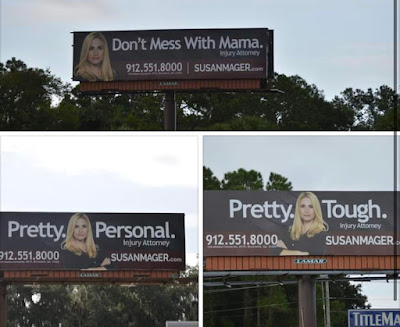 billboards advertising a female lawyer