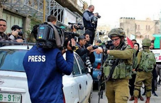 Wafa: 26 Israeli violations against journalists last month  Ramallah Wafa - Tariq Al-Astal The Palestinian News and Information Agency "Wafa" monitored 26 violations of the rights of journalists in the Palestinian territories by the Israeli occupation authorities during the month of February.  In its monthly report on Israeli violations of journalists, "Wafa" confirmed that the Israeli occupation forces continue and deliberately target Palestinian journalists as part of a programmed policy with the aim of limiting their activities and their role in covering the events, practices and violations they implement against defenseless citizens.  She explained that the number of journalists injured during the month of February as a result of rubber-coated metal bullets, gas and sound bombs, severe beatings, in addition to other attacks, amounted to 18. .  The report indicated that on 1/2 of the occupation court sentenced freelance journalist Asim Al - Shannar to six months in prison, on charges of providing services to illegal parties, without the occupation prosecution explaining or proving what these illegal charges are, and he is currently detained in Megiddo Prison.  The occupation forces had arrested the journalist Al-Shannar from the city of Nablus, while he was traveling abroad to continue his higher studies through Al-Karama Crossing on 9/26/2021.  On February 3, the occupation forces targeted G Media photographer Laith Jaar with a gas bomb that hit him in the neck and a rubber bullet in the shoulder, while the freelance photographer Wahaj Bani Mufleh was detained for an hour, while they were covering the confrontations that erupted between them and the residents of Beita village, south of Nablus.  On 4 February, the occupation forces also targeted journalist Raja Marouf Jabr with a rubber-coated metal bullet that hit her in the face, while she was covering the confrontations that erupted between soldiers and Palestinian youths in the town of Beita, south of Nablus.  On February 10, the military court of occupation sentenced the captive journalist Yazan Jaafar Abu Salah from the town of Arraba in the city of Jenin in the occupied West Bank, to 4 years in prison, in addition to a fine of 3,000 shekels, after his trial was postponed for the 22nd consecutive time.  In addition, on February 11, 2022, the occupation forces targeted freelance journalist Muhammad Thabet with a rubber-coated metal bullet that hit him in the right hand, while journalist Louay Samhan suffocated while covering the confrontations that erupted between him and the residents of Beit Dajan village, east of Nablus.  On February 12, the occupation forces attacked the cameraman of the "Quds News Network" Abdullah Bahsh, the bureau chief of the Turkish "Anadolu Agency", journalist Anas Janli, the agency's cameraman Issam al-Rimawi, and the correspondent of "Reuters" agency, Raneen Sawafta, with severe beatings, in addition to targeting them with bombs. Gas and sound, while covering the clashes that erupted between them and the residents of Beita, south of Nablus.  On February 13, settlers attacked freelance photographer Raja'i al-Khatib and sprayed pepper gas on his face, while other settlers obstructed the photographers' work while covering the events in the Sheikh Jarrah neighborhood in Jerusalem.  On February 16, the occupation police prevented Palestinian journalists holding Palestinian and international press cards from entering the Sheikh Jarrah neighborhood in Jerusalem and covering the events inside it. Barriers were erected around the neighborhood, and only Israeli press card holders were allowed to enter.  Moreover, on February 18, the occupation forces targeted the “Quds Network” cameraman, Abdullah Bahsh, with a rubber-coated metal bullet that hit him in the back, and a stun grenade hit him in the foot. Fawzi suffocated severely as a gas bomb was thrown at them, and severely beat Anadolu Agency cameraman Hisham Abu Shakra, while they were covering the activity of resisting settlements in Jabal Sabih, south of Nablus.  On February 19, the occupation forces targeted the "French Agency" photographer Jaafar Shtayyeh with a sponge bullet that hit him in the hand, causing a tear in the muscle of the hand, while covering the confrontations that erupted between him and Palestinian youths in the town of Beita, south of Nablus.  In this context, on February 20, the occupation forces assaulted a number of journalists while covering the assault on residents and young men with batons, pushing and beating on Al-Wad Road in the Old City of occupied Jerusalem, as a result of which a journalist was injured in the head.  On February 25, Palestine TV cameraman, Iyad Hashlamoun, sustained moderate injuries while covering the occupation forces’ suppression of a demonstration in the center of Hebron, in commemoration of the twenty-eighth anniversary of the Ibrahimi Mosque massacre, and a demand for the evacuation of settlers from the heart of Hebron.  On 27/22 the military court of occupation issued an actual prison sentence against journalist Youssef Yaqoub Fawadila from the town of Aboud - Ramallah to 16 and a half months in prison, and a fine of 2,000 shekels. The Military Prosecution submitted a list of false accusations against him, and he is now in Ofer Prison.  On the same date, a settler prevented press crews from covering the attack by the occupation forces on the solidarity activists at the entrance to the village of al-Lubban al-Sharqiya, Nablus District.  On February 28, the occupation forces beat and pushed the Jerusalemite photographer, Ahmed Abu Sobeih, during his media coverage in Bab Al-Amoud area in Jerusalem.