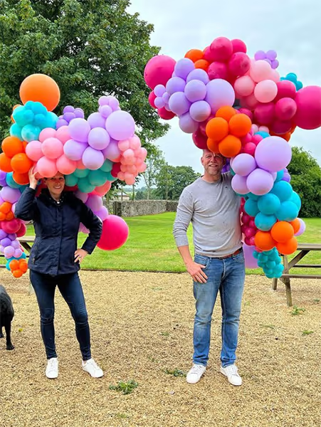 The pair played around with balloons