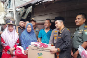 PJ Bupati Syakir Menyerahkan Bantuan Masa Panik 